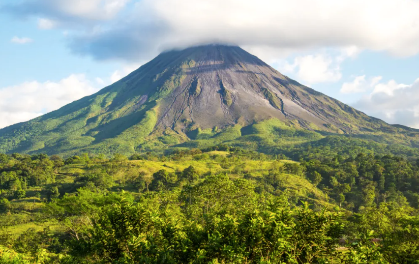 The town La Fortuna is home to the famous Arenal Volcano and also known as the adventure capital of Costa Rica. It offers a beautiful rainforest, impressive waterfalls, an abundance of wildlife, and the typical Costa Rican “campesino (farmer)” culture.The Arenal Volcano became famous because it consistently spewed lava, gas, and ash until it went into a resting phase, in 2010. Although you can no longer see lava, the perfectly symmetrical volcano it is still very impressive. Arenal offers nearly every adventure activity you can think of. The area has amazing activities and scenery straight out of “Jurassic Park,” minus the dinosaurs.