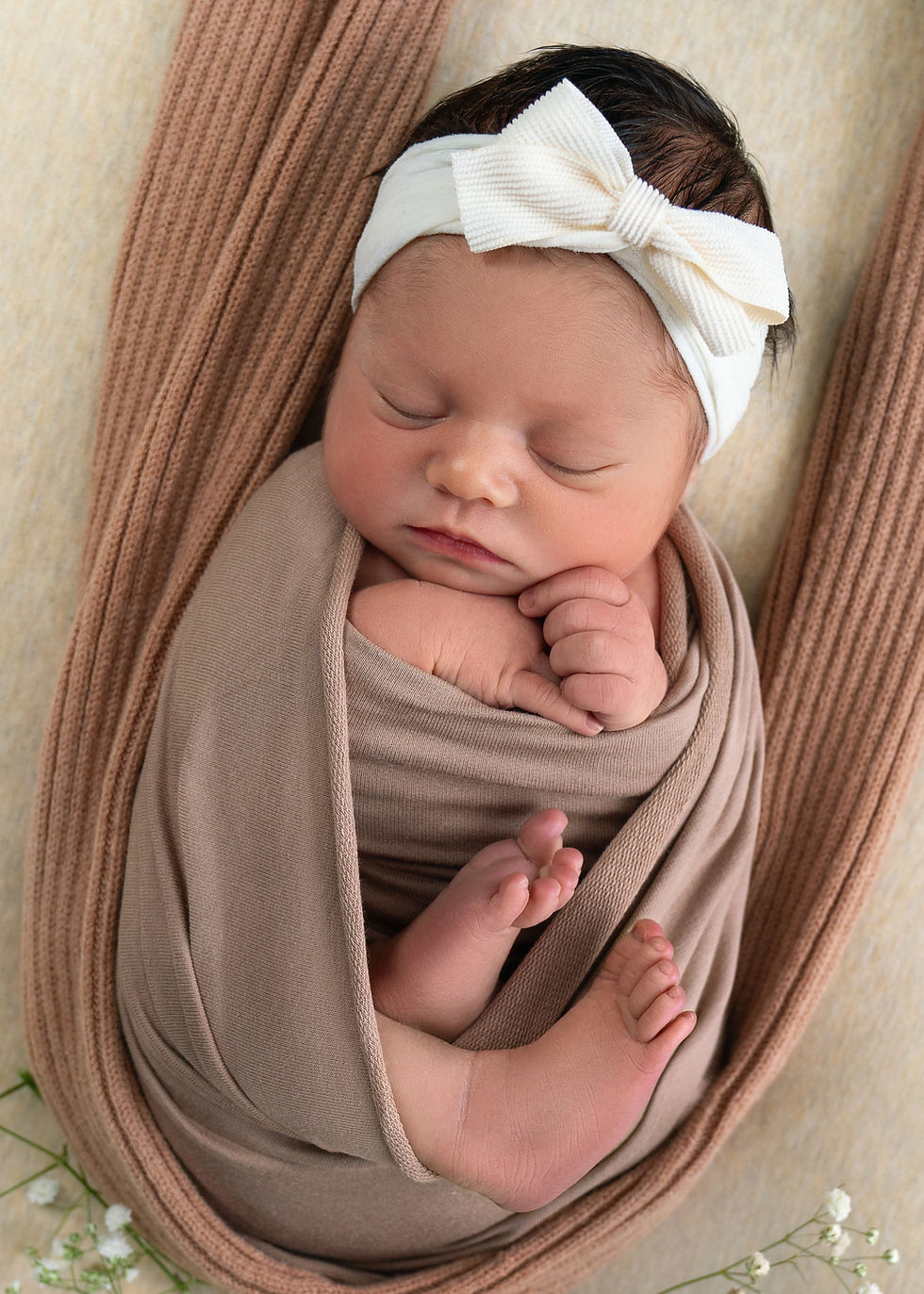 newborn in wrap photo