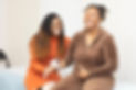 Dr. Cheryl Edinbyrd, licensed midwife, sharing a joyful moment with an expectant mother during a prenatal visit at The Tree of Life Birth Counseling & Wellness Center in Dallas. Compassionate, inclusive maternity care.