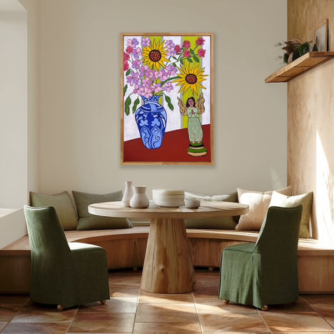 Flowers in blue vase with angel