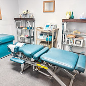 Chiropractic treatment table in Crest Hill Clinic's office, ready for personalized care