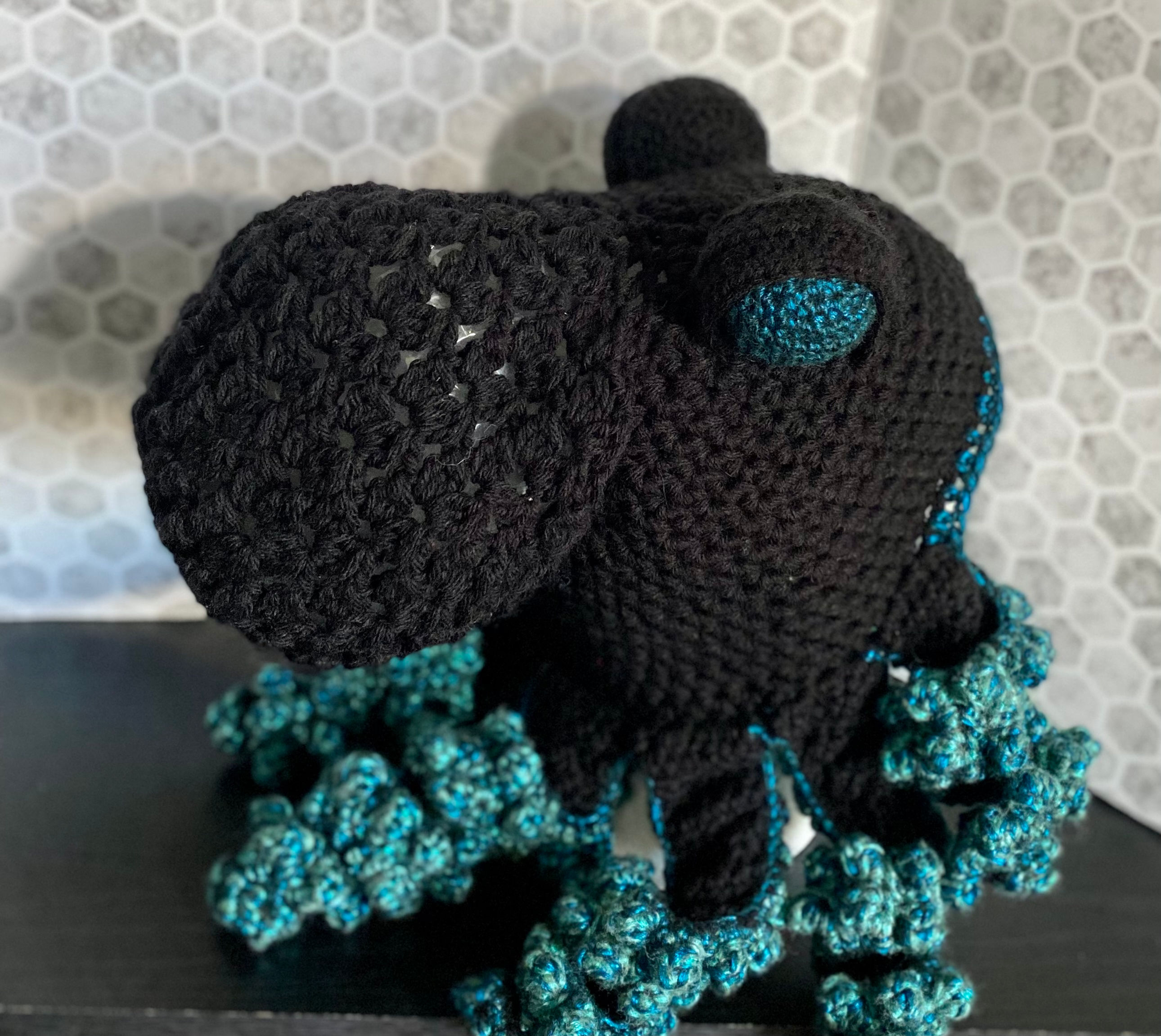 Black/metallic teal Kraken hat