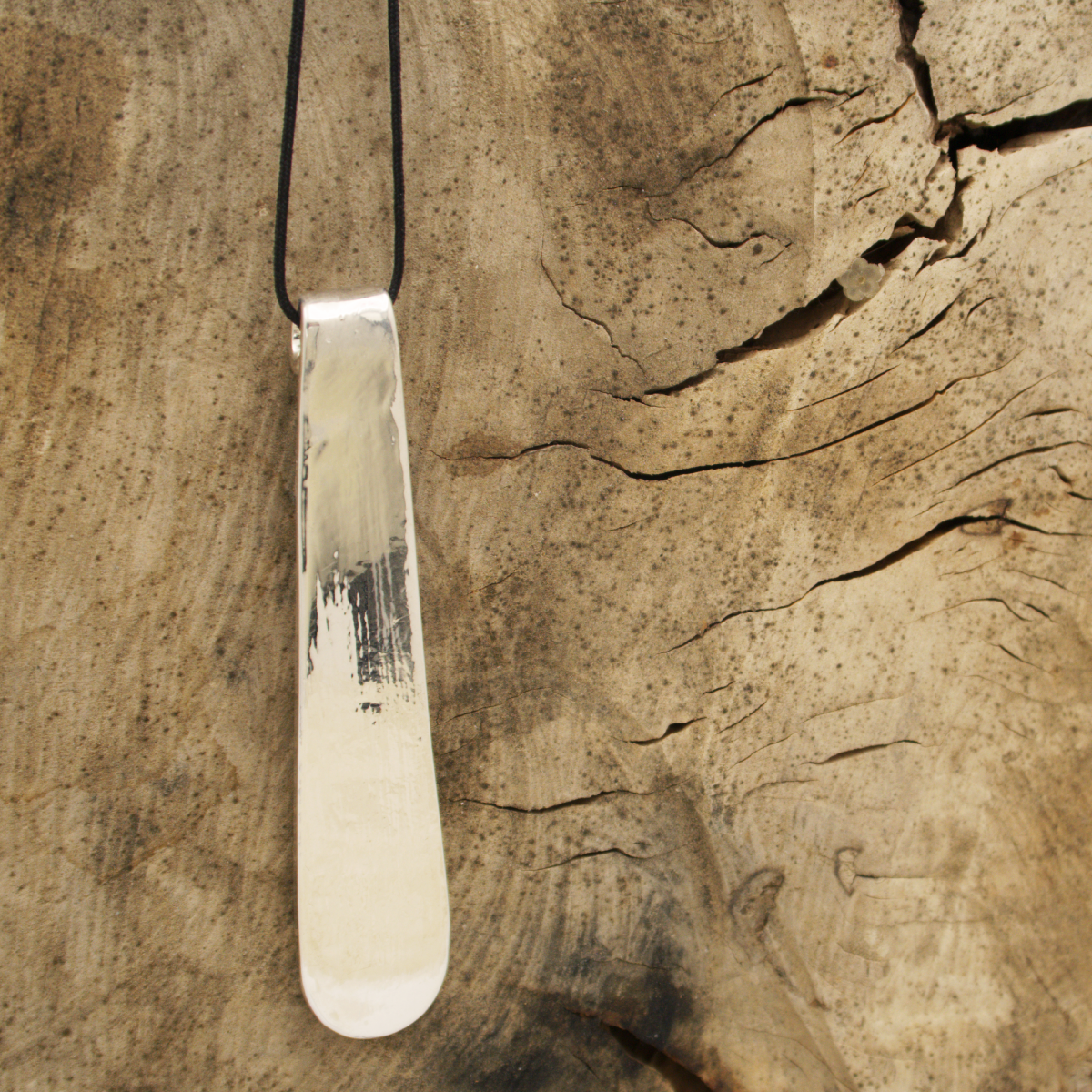 Mara silver-coated pendant