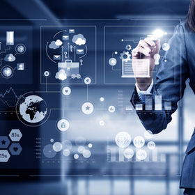 Woman using modern technologies for busi