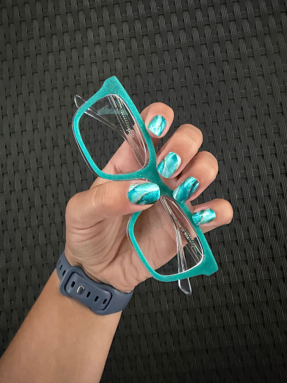 Thumbnail: Teal We Meet Again teal marble nail wrap on hand model