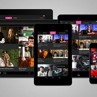 Photograph of multiple digital devices showing BBC iPlayer app