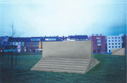 Cube, wall & stairs in cityscape