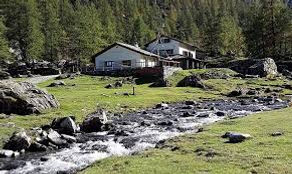 Torre Pellace a home by stream.jpg