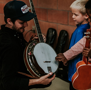 On Feb 24, Can’d Aid Partners w/ Steep Canyon Rangers to Donate Instruments to Youth in Asheville