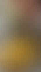 תפוח אדמה חתוך לקוביות על יד קערה עם בטטה וכרובית