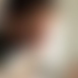 Robin Williams smiles as Dr. Patch Adams while a child patient playfully squeezes his red clown nose, highlighting the power of humor in healing.