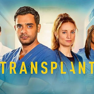 Transplant TV series cast Hamza Haq, Laurence Leboeuf, and Ayisha Issa wearing medical scrubs in a hospital hallway for the popular medical drama.