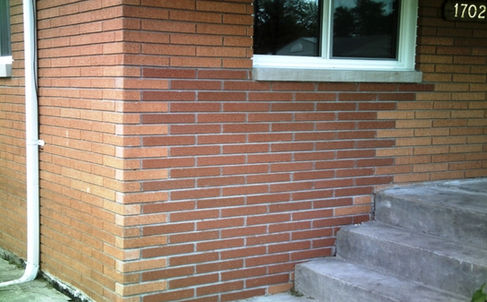 Before brick stain on a home repair