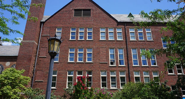 Large beautiful university building after brick stain