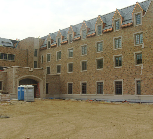 Before brick and mortar staining on University building
