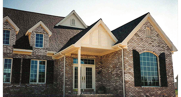 Before staining brick home white