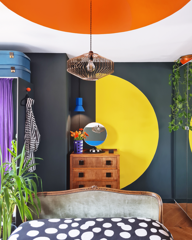 Hannah Drakeford a colourful bedroom design with geometric shape painted murals London new build apartment interior design