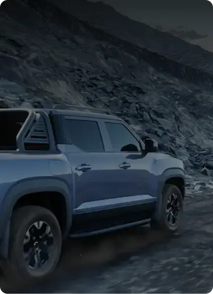 Pickup truck on a rugged mountain path