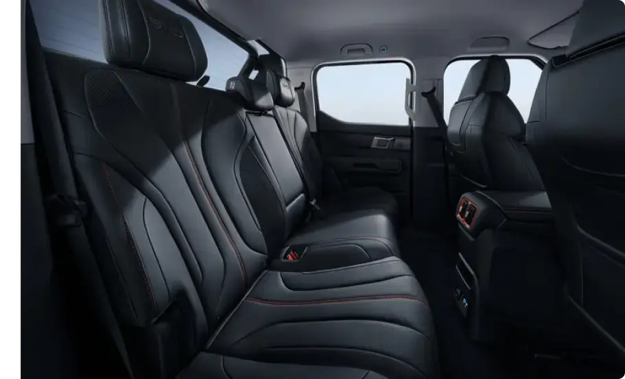 BYD Shark 6 spacious rear interior with black leather seats