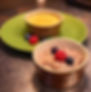 Crème brûlée and chocolate mousse desserts with berries