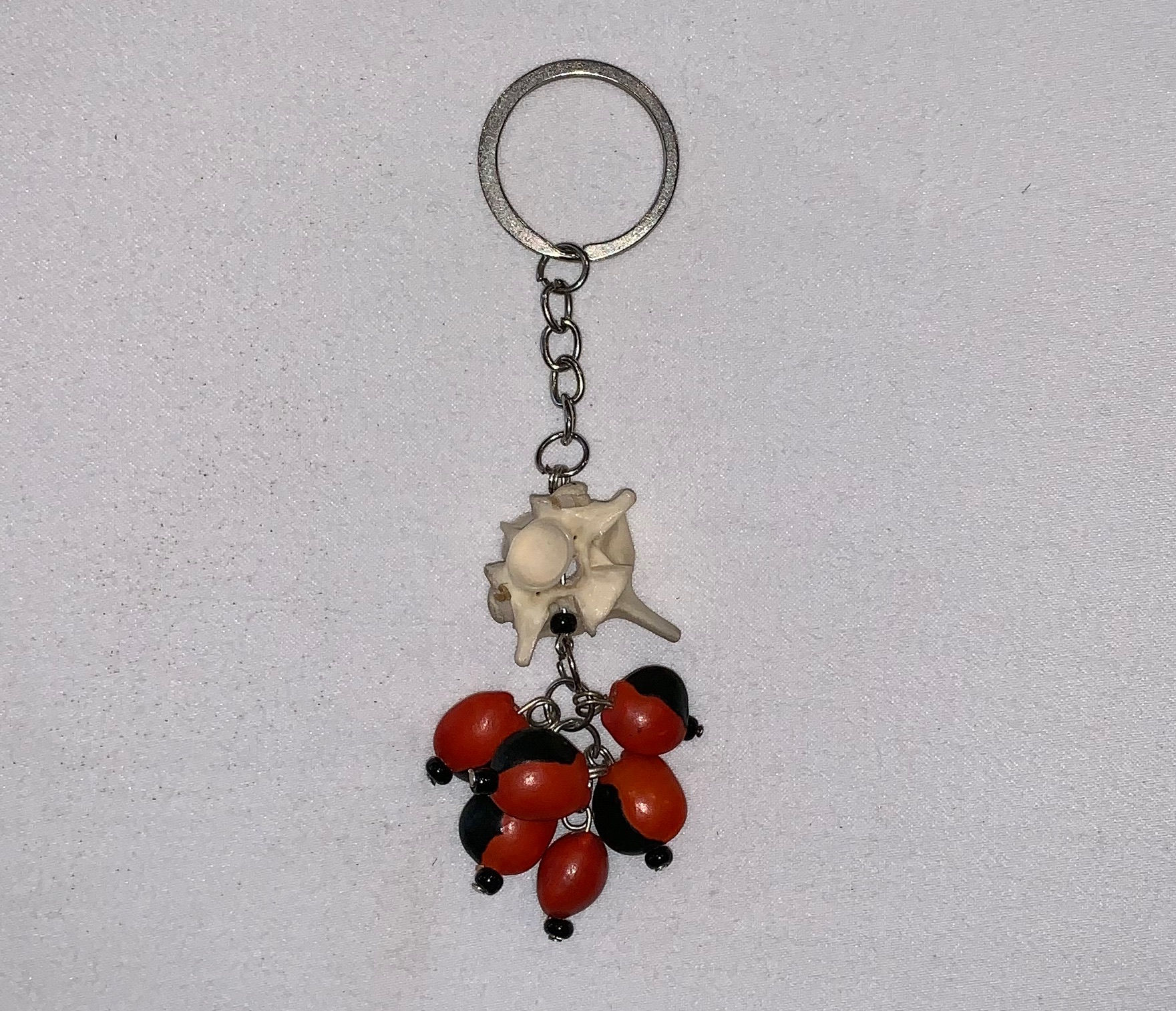 GK24 Huayruro & Serpent Vertebra Key Chain