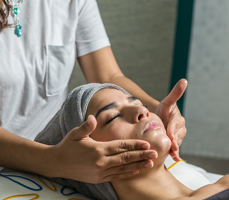 woman-enjoying-facial-massage-in-center-2025-03-06-01-17-20-utc.jpg