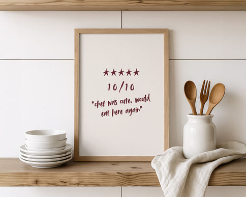 Minimalist kitchen wall art with humour quote displayed on shelf