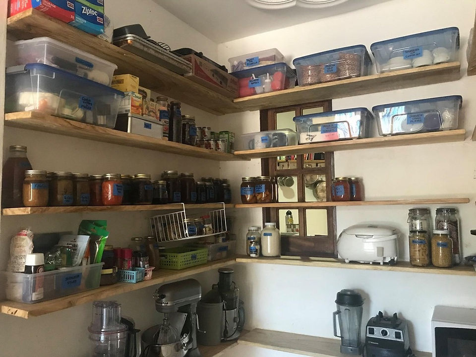 Shelves stocked with jars and food