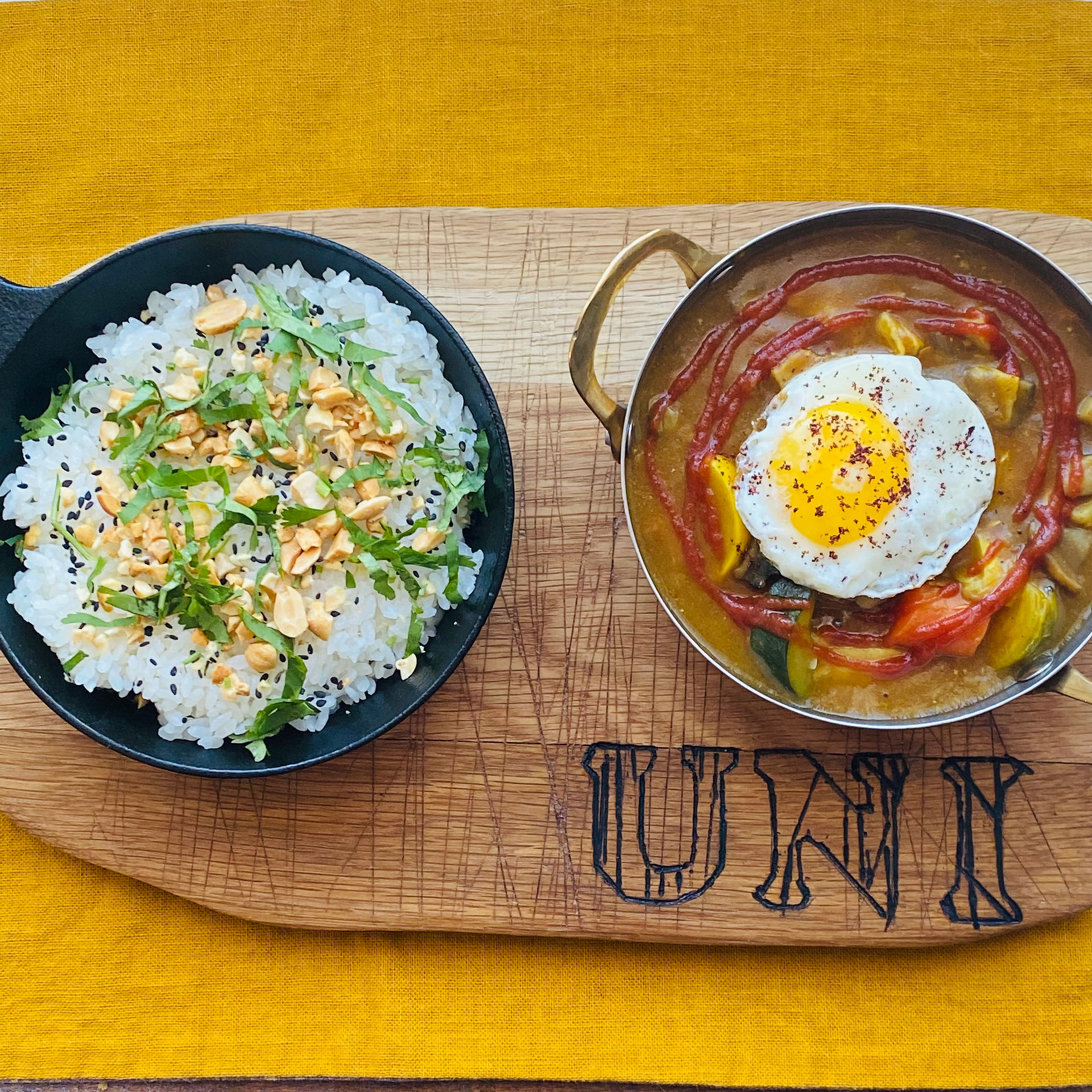 Curry and Rice on U & I Cutting Board by Aric with rice dish in a bowl
