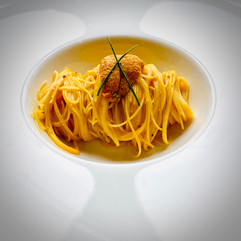 Sea Urchin Pasta on a white plate.