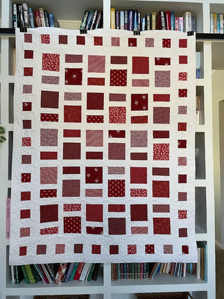This CalicoGrace quilt was created using a Quilt Path Design for one of our clients.