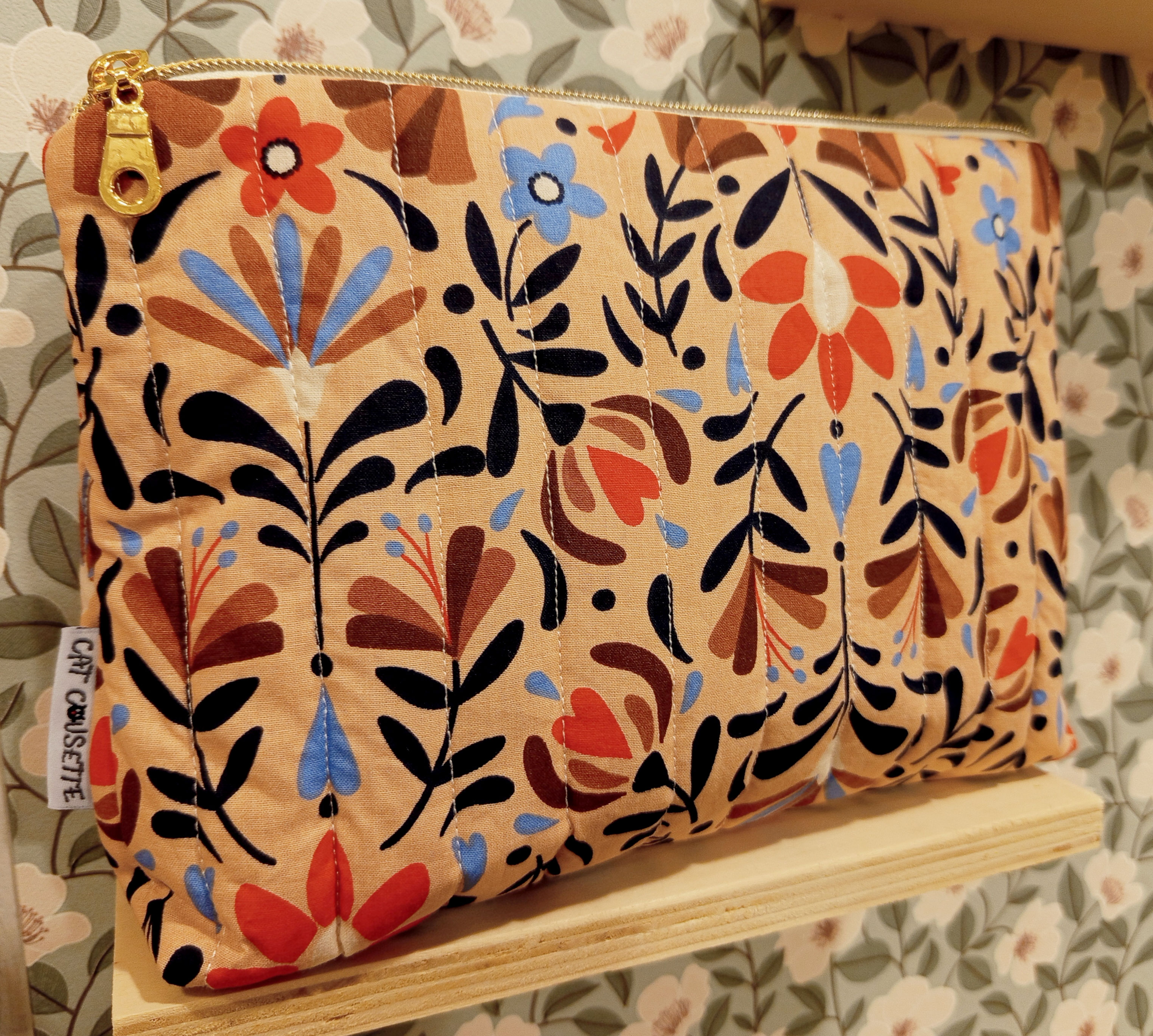 Trousse matelassée feuillage 