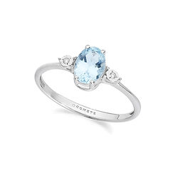 Anello da donna in Oro bianco 375‰ con Diamanti bianchi e Acquamarina ovale della Collezione Storia di Luce Colore di Comete Gioielli