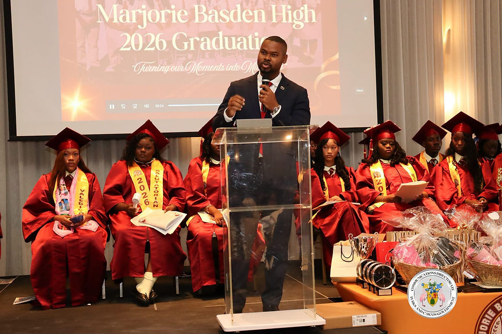 Hon. Jamell Robinson delivering a speech at the Marjorie Basden High School in South Caicos