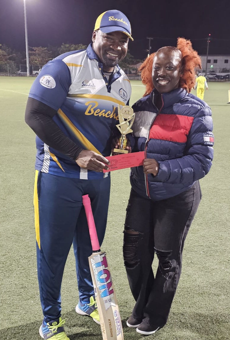 Sidue Hunter collecting his Player of the Match Award