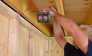 Image of Step 2 - showing how to secure the end joist to the outer wall frame.