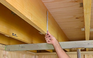 Image of Step 3 - showing how to use template to set out the mounting brackets in the correct position.
