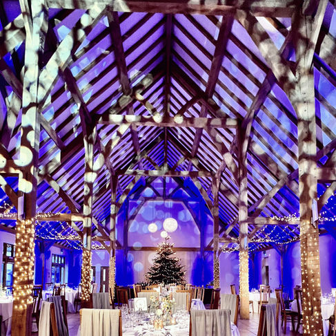 Festive Wedding Celebration. Ceiling projections, fairylights and uplighting.