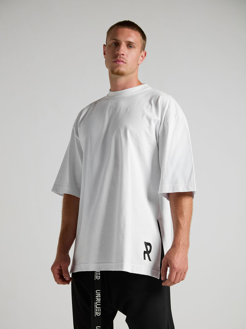 Men's white oversized premium cotton T-shirt from the UNRULED INSIDE Collection.