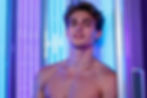 freepik__a-handsome-young-man-inside-a-modern-tanning-booth__31035_edited.jpg