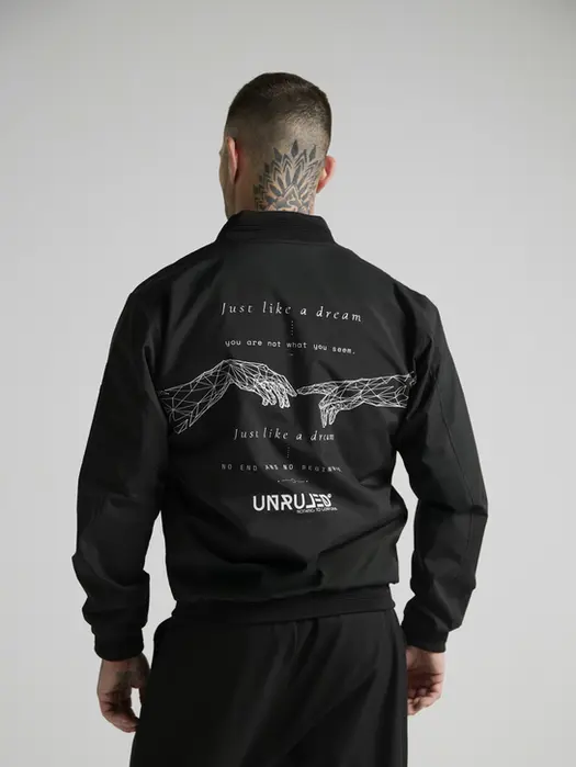 Model wearing UNRULED luxury streetwear from the latest collection