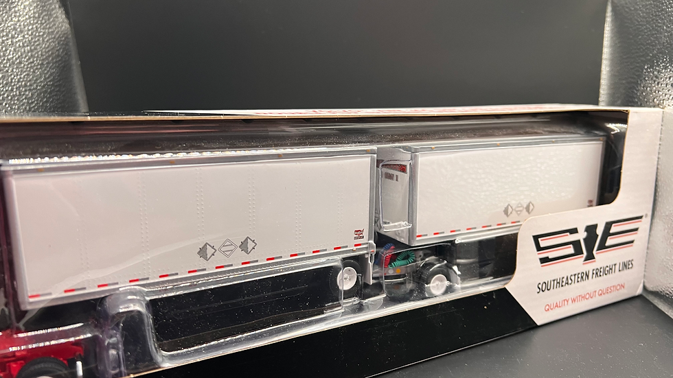 Thumbnail: 1:64 Volvo VNR 300 Day Cab & Wabash Dbl Pup Trailers