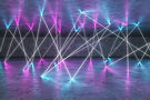 empty-big-room-with-searchinf-neon-lights-disco-style-with-blue-purple-reflections-concret