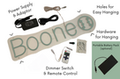 An image of the Boone sign showing the power supply & adaptor, hardware for hanging, holes on the sign for easy hanging, dimmer switch and remote control. Also shows Portable battery pack as optional in the bottom right corner.