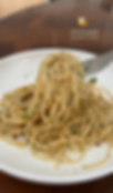 Spaghetti Dust Seasoning shown on al dente pasta with olive oil
