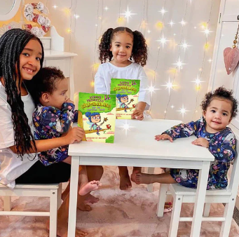 Kids in a playroom reading Grumbalina And The Cardboard Wand - Book 2