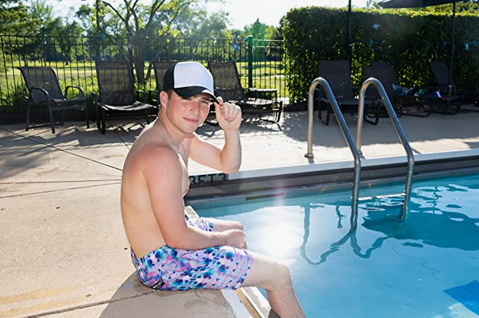 Thumbnail: Guy at pool wearing adult foam trucker hat in white and navy
