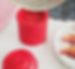 An image of someone pouring bacon grease into the Bacon Bin Grease Holder Strainer