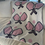 Thumbnail: Pickleball Blanket white with pink paddles shown over a white couch