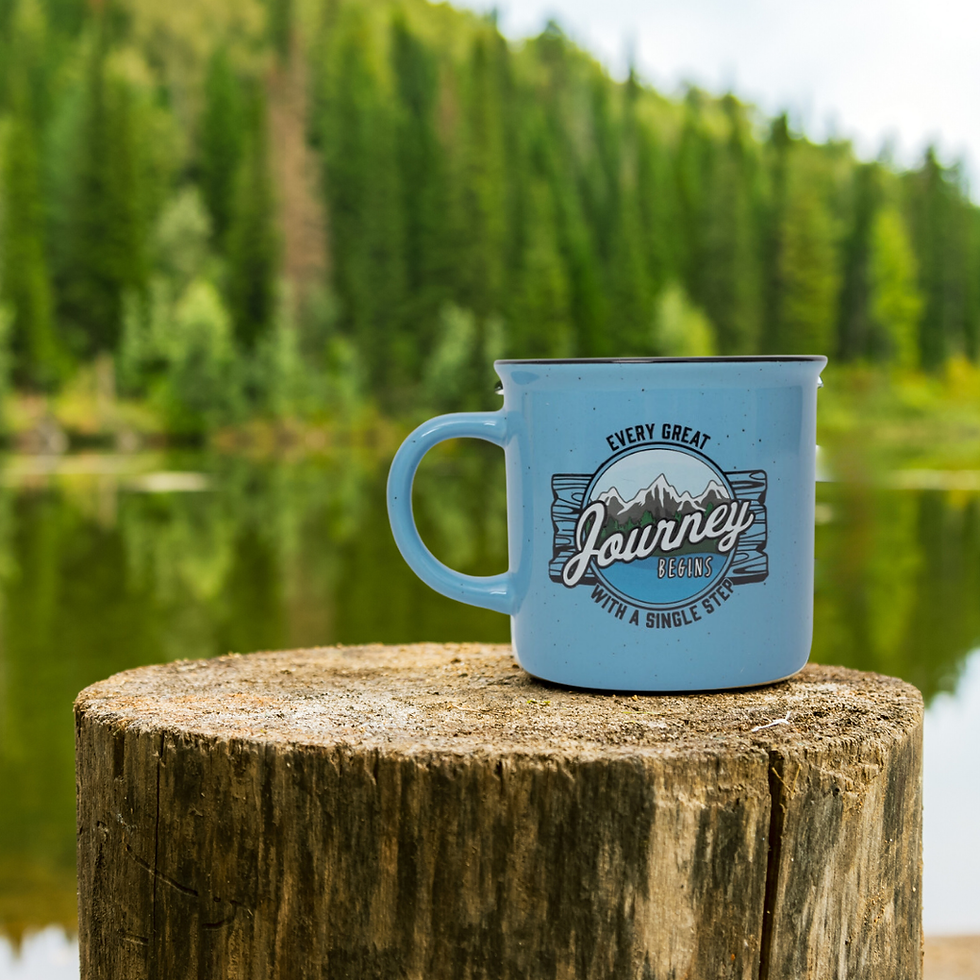 Thumbnail: Journey Ceramic Camp Coffee Mug shown in a mountain setting